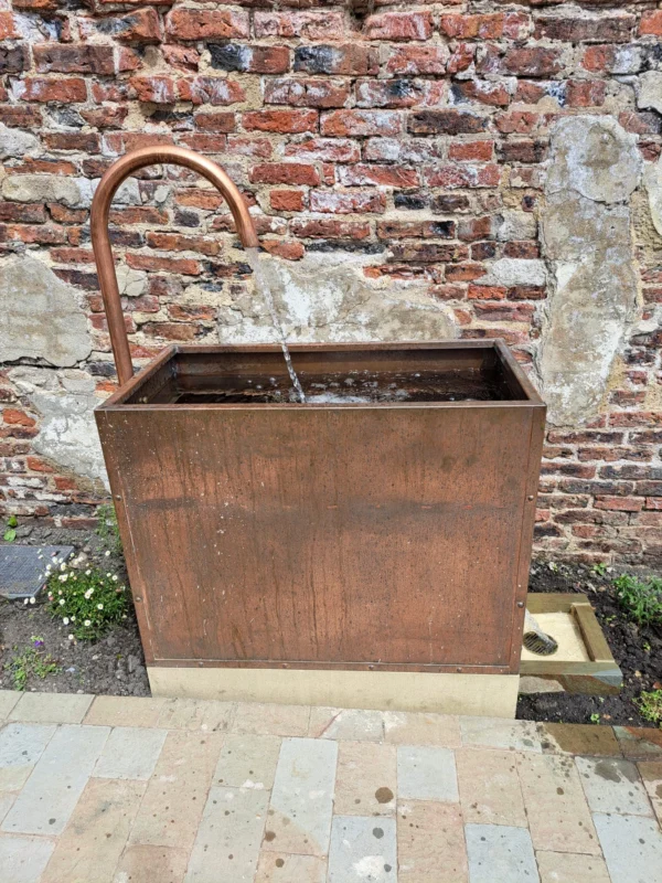 A wooden outdoor sink.